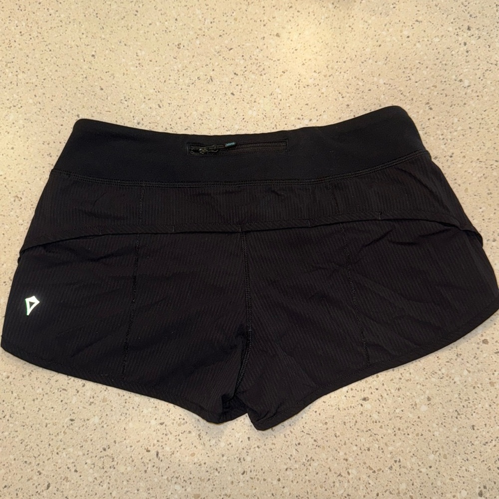 Ivivva by lululemon girls size 14 lined 2.5 inch inseam black with black stripes